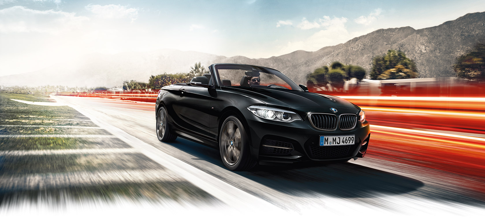 La emoción del convertible BMW M240i se experimenta en la carretera Carro deportivo convertible M de BMW con motor de gasolina de 6 cilindros