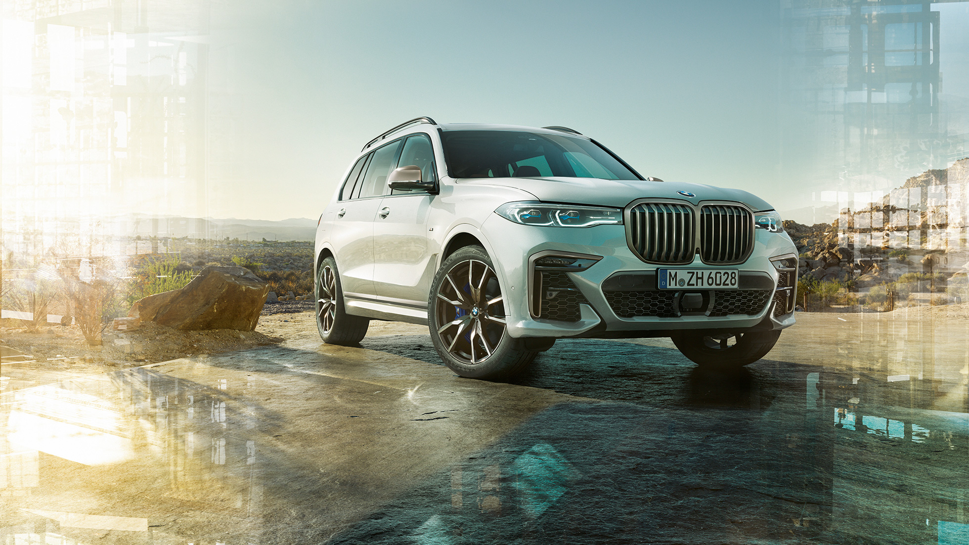 El BMW X7 M, vista frontal de tres cuartos El BMW X7 M en Mineral White, sin movimiento, vista frontal de tres cuartos, G07, 2019